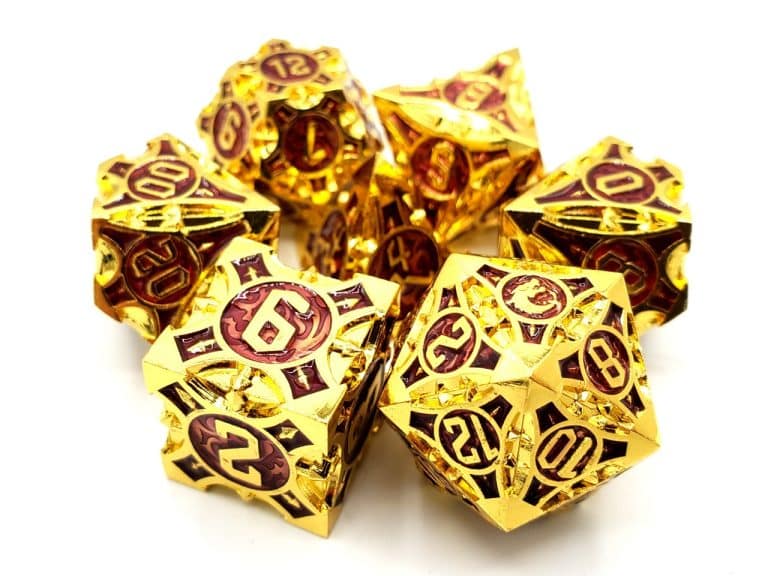 Old School 7 Piece Dice Set Metal Dice Gnome Forged Gold With Purple Pose 1